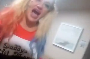 Moment drunk woman dressed as Harley Quinn launches attack on cop in caravan