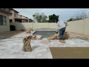 Artificial Turf and Travertine Around Swimming Pool