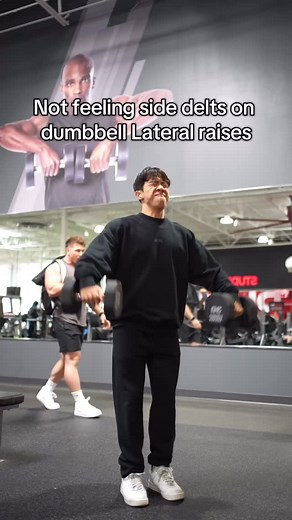 225K views · 2.6K reactions | If you’re not feeling your side delts on dumbbell lateral raises you’re likely using more momentum than you might think.. usually coming from your hips. In my opinion the easiest way to learn strict form on lateral raises is by having a straight elbow, slight lean and focusing on pushing outwards rather than upwards. | Tyler Path | Facebook