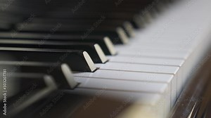closeup of piano black and white keys wooden keyboard in motion. abstract isolated shot of musical instrument. aesthetic of music, sound, harmony, art, image concept.