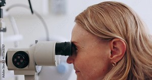 Eye care, machine test and woman in office to check iris, pupil and eyesight with professional. Technology for vision exam, light and patient in clinic for assessment for glasses, lens or glaucoma.