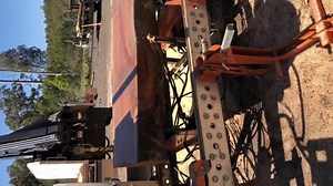 Rolling some grey box with the Hd36 hydraulic log turner | Norwood Portable Sawmills