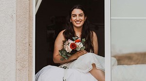 Quarantined bride doesn't let COVID-19 diagnosis get in the way of wedding day