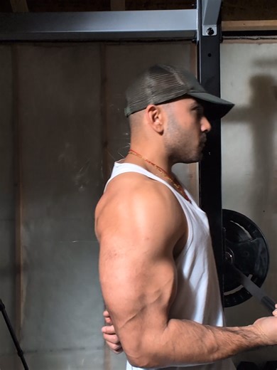 Inverted Row (Bodyweight Barbell Row / Australian Pull-Up) (Single-Arm or Two-Arm Variation). This exercise is performed using a squat rack with a barbell set around belly-button height. You position yourself behind the bar, grip it (with one hand or both), and walk your feet slightly under the bar so your body is tilted backward at an angle. Keeping the body straight—no knee bend and no hip sag—you slowly lower yourself back until the arms are fully extended. From this stretched position, you p