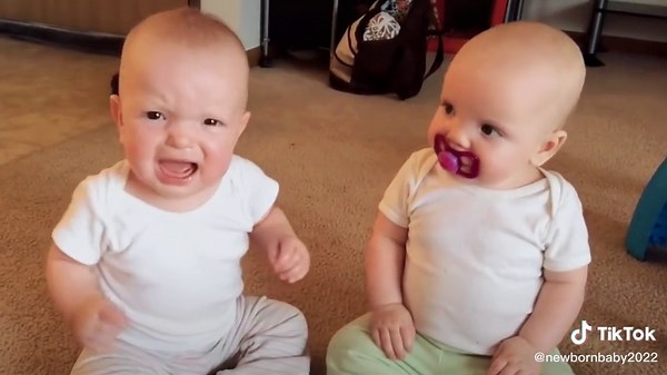Adorable Twin Baby Girls Fighting Over Pacifier