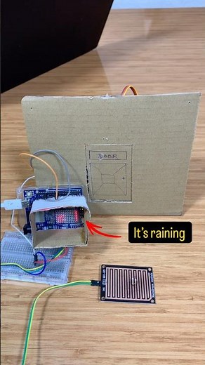 Rain Detection with Arduino: Servo Control, LED Alert,and LED Matrix Display