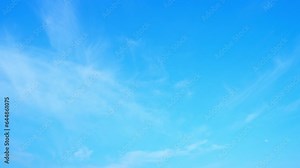 Timelapse : The sky's azure hue serves as a serene backdrop, while the clouds dance and transform, painting masterpiece of nature, captivating viewers with its dynamic beauty. 4K Time-lapse. HDR