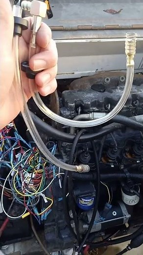 Bobcat 873 fuel pickup hose and filter/check valve.