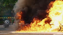 Firefighters' nighttime fire suppression training by simulating fire...