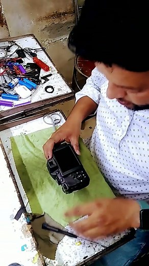 camera repairing Nikon cooLplx P520