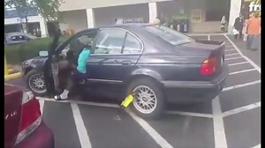 This Driver Isn't Letting A Boot On His Car Stop Him From Driving!