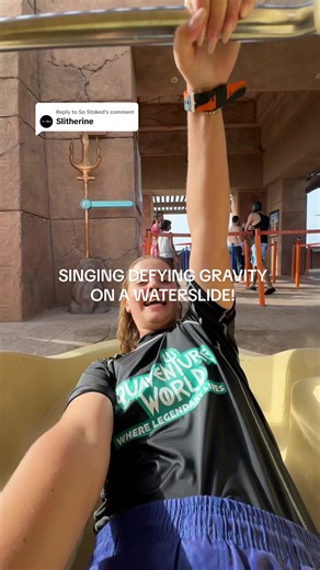 Singing Defying Gravity on a Waterslide