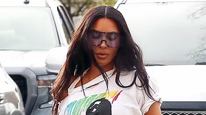 Kim's shrinking butt & thin frame drowns in baggy jeans for new pics