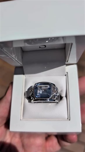 We love collection day when our lovely clients get to pick up their showstopping new pieces of custom jewellery. ✨ Today is one of those days. 💙 This stunning aquamarine and diamond ring has been months in the making, and watching our client's face light up as she slips it on for the first time? That's the moment that makes everything worth it. The emerald-cut aquamarine takes centre stage, beautifully framed by white gold and intricate bow detailing that honours the original heirloom piece. We
