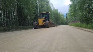 Grading for the Greater Good! This motorgrader is hard at work along Haystack Road, supporting suppression efforts on the #HimalayaRoadFire, #AggieCreekFire, and #ObrienFire. Far from routine maintenance, this work is critical to the firefight-these machines help: - Build and reinforce control lines - Improve access for engines and crews - Create safer evacuation and reentry routes - Reduce erosion and road damage post-fire Behind every smooth road is a smoother operation. Huge thanks to the ope