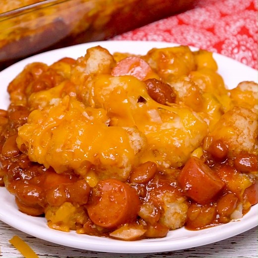 2.5M views · 455 reactions | Cheesy Hot Dog Tater Tot Casserole is pure comfort food. Sliced hot dogs, chili, tater tots, and cheddar cheese combine to make an easy and delicious meal. This redneck casserole is sure to be a family favorite. Recipe: https://spicysouthernkitchen.com/cheesy-hot-dog-tater-tot-casserole/ | Spicy Southern Kitchen | Facebook
