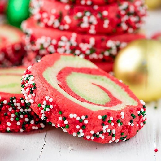 These Spiral Christmas Sugar Cookies are soft and chewy and full of festive colors! ✅ RECIPE: https://thestayathomechef.com/spiral-christmas-sugar-cookies/ | The Stay At Home Chef