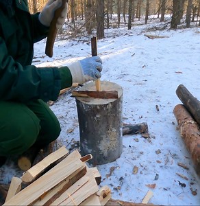 Constructing a warm subterranean survival shelter, fireplace composed of stone and clay, cooking. | Adventure and Nature
