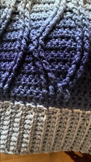 Crochet Easy Beginner Cable Blanket, smooth curves of the cables highlighted by the ombre yarn