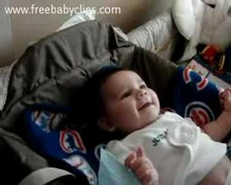 Dad changes babys poopy diaper