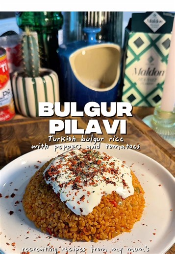 Turkish Bulgur Pilavı (rice) 💗✨ This Sunday we are remaking my grandmothers bulgur pilavı recipe from my mum’s cookbook🥹. Bulgur pilavı is a classic Turkish dish and is a delicious and more nutritious alternative to rice! It’s nutty, full of flavour and so easy to make! Serve with yoghurt, meats, grilled vegetables and enjoy. 💗 Melt a large knob of butter in a pan then add 1 diced white onion. Sauté till translucent, then add one thinly sliced Turkish green pepper and one red pepper. Give it 