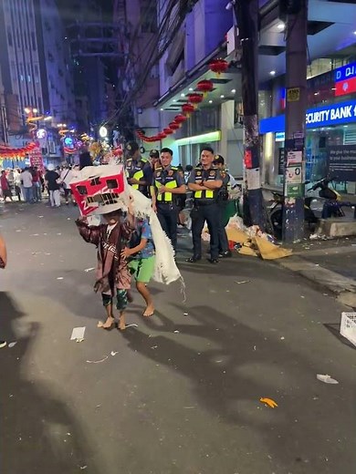 Kids perform DIY dragon dance for Chinese New Year in Ongpin, Manila, Philippines