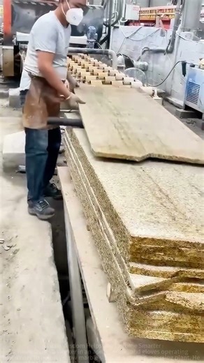 Stone Processing Scene: Worker Hand-Machine Polishing Marble Slabs