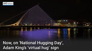 Adam King's 'virtual hug' sign is set to light up locations across the country this evening. The six-year-old Toy Show star is encouraging people to send a 'virtual hug' to someone they care about #NationalHuggingDay ❤️🤗 | RTÉ News