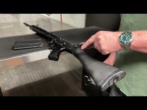 Firing the L1A1 Self-Loading Rifle (SLR).