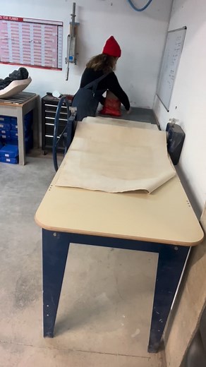 My process begins by rolling soft clay slabs, which I wrap around...