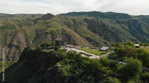 Popular temple Garni, In Armenia. flying around Garni pagan in Caucasus. The hellenistic temple in Caucasus. Ancient archeological ruins in Armenia. . High quality 4k footage