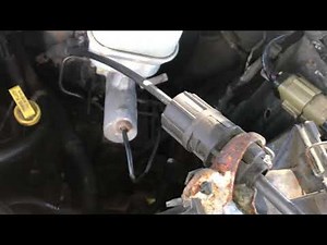 Shifter cable adjustment for Mazda Tribute and Ford Escape
