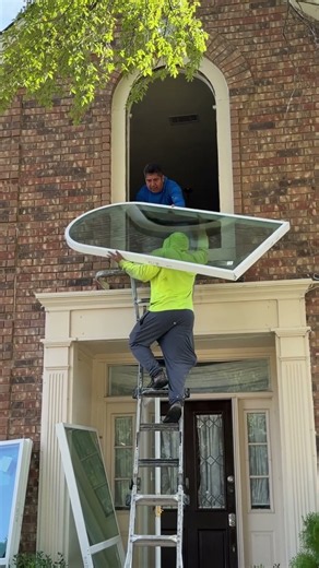 Installing a picture window.