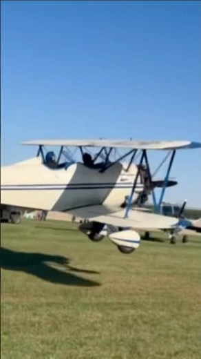 Biplane skids off runway!