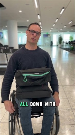 Frist time using my quick-release under-seat wheelchair bag