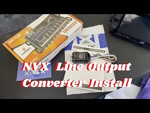 Installing NVX Line output converter in preparation for DSP and 4-Channel amp