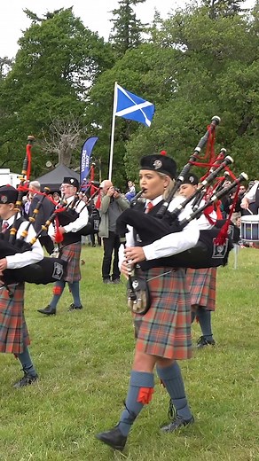 Video #reel showing Blairgowrie, Rattray & District Pipe Band marching into the Games field playing "Scotland the Brave" during the 2022 Strathmore Highland Games. These are held in the grounds of beautiful Glamis Castle in Forfar, Angus, in early June each year. The band who are based in Blairgowrie and Rattray are led by Pipe Major Calum Patterson and they wear Clan Macpherson's bonnet, Glengarry badges and kilt pins and the old red Macpherson tartan. #scotland #scotlandtravel #strathmore #hig