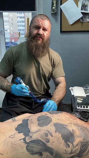 Skull Tattoo Process: Detailed Ink Work in Studio