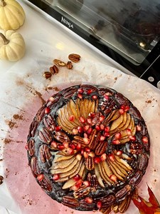 6.5K views · 42 reactions | This Chocolate Pecan Pear Cake by Alina P. is *almost* too pretty to eat.  Head to Ninja Test Kitchen for the full recipe & many more: https://bit.ly/3m2kf0L. The Ninja® Foodi® Dual Heat Air Fry Oven is perfect for all your holiday baking, roasting, and air frying needs. | Ninja Kitchen | Facebook