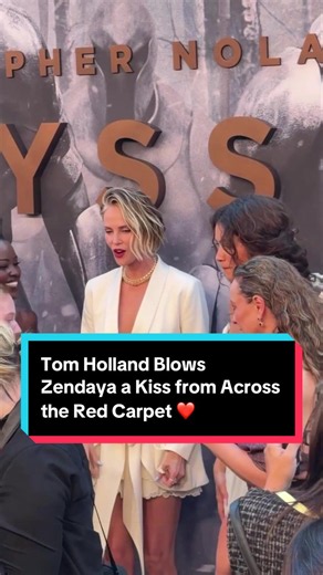 Tom Holland blows Zendaya a kiss on red carpet — The Odyssey moment