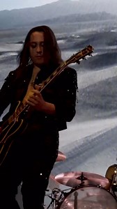 Torn, I turn to my bow. The Archer, captured live in Tempe, AZ. | Greta Van Fleet