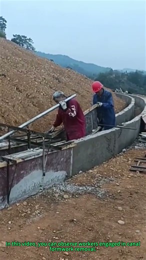 Canal Formwork Removal: Workers Demolish Mold to Complete Concrete Water Channel