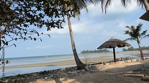 Picturesque beach with beautiful nature, garbage dump of plastic bottle, bag, paper is lying around. Environmental pollution. Vacationers left picnic waste trash by sea. Ecology, the danger of mankind