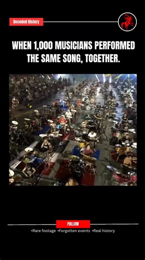 Decoded History on Instagram: "n 2016, the Rockin’1000 “That’s Live” festival brought together one of the largest musical groups ever assembled: 1,000 musicians performing at the same time. Drummers, guitarists, bassists, and singers filled an entire stadium, all coming together to play Smells Like Teen Spirit as one massive, unified sound. The result wasn’t just loud — it was powerful, emotional, and almost overwhelming to watch. Seeing that many people, all in sync, turning one song into a ful