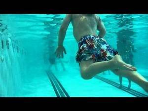 William swimming around in the pool