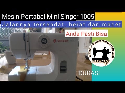 Mengatasi macet mesin jahit portabel mini Singer 1005