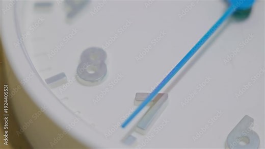 Close-up of an analog clock as the second hand passes numbers seven and eight. Detailed ticking sequence and precise visual representation of seconds. High quality 4k footage