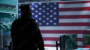 US military officer supervising threat detection activity in high tech office, examining top secret data on big screen. American army soldiers managing hybrid war, cyber attack prevention. Camera A.