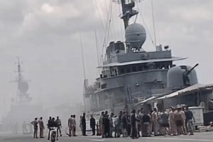 Frigate damaged by ammunition from another naval ship