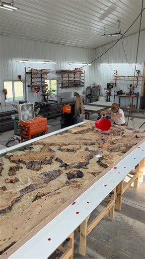 Oakmond Design on Instagram: "Pouring 150 liters of clear epoxy to start creating the rivers that will showcase all the natural beauty of the cottonwood burl slabs and gold leaf inlay!"